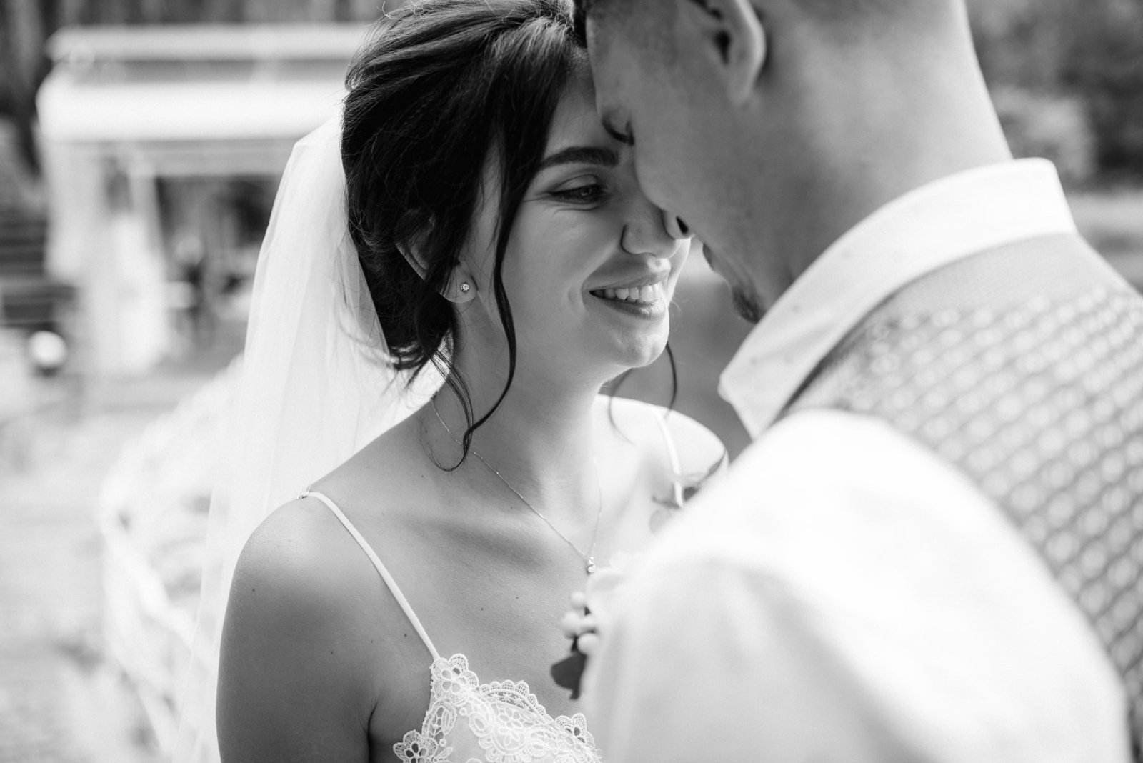 Bride and groom smiling closeup